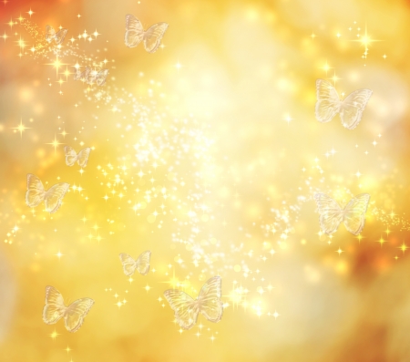 Butterfly on yellow abstract lights backgroundの写真素材