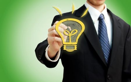 Businessman with a Good Idea 'light bulb'の写真素材