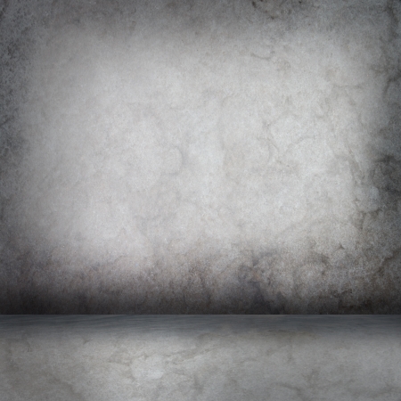 Grey concrete wall and floor with shadowの写真素材