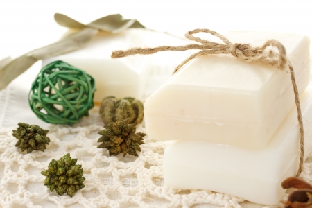 Bars of soap with green potpourrisの写真素材