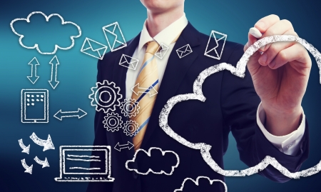 Business man with connectivity through cloud computing conceptの写真素材