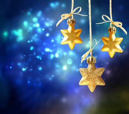 Christmas star ornaments in the nightの写真素材