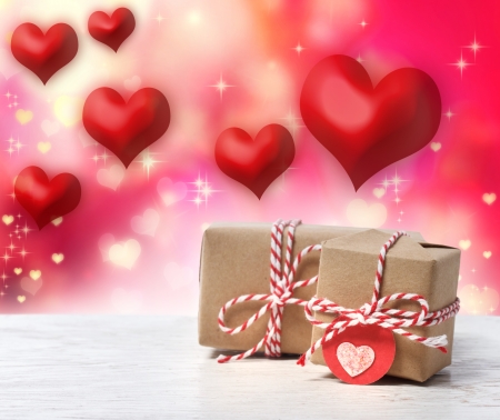 Small handmade gift boxes with red heartsの写真素材