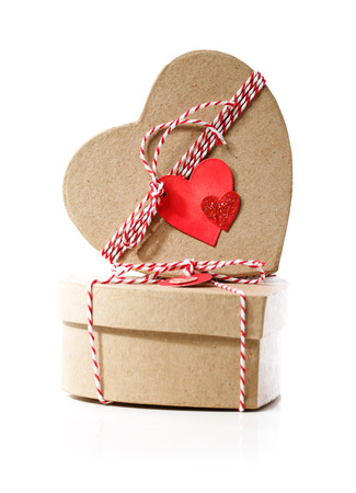 Heart shaped gift boxes with heart tags isolated on white backgroundの写真素材