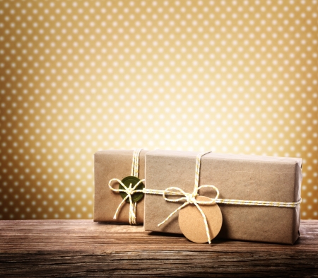 Handmade gift boxes over polka dots backgroundの写真素材