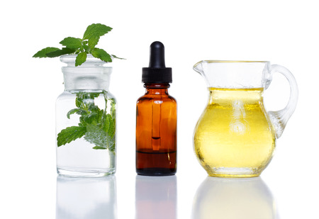 Herbal medicine dropper bottle with mint water with oilの写真素材