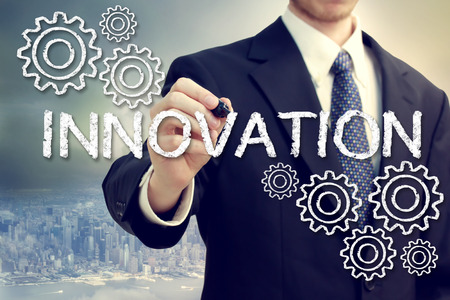 Business Man Drawing Innovation Concept with Gearsの写真素材