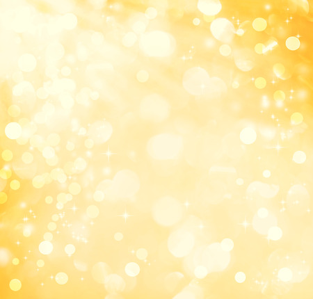 Golden yellow abstract shiny light and glitter backgroundの写真素材
