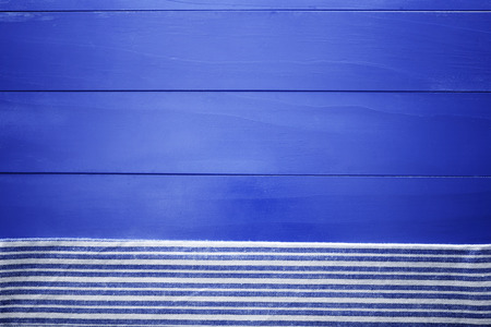 Blank blue wooden boards with napkin aligned horizontallyの写真素材
