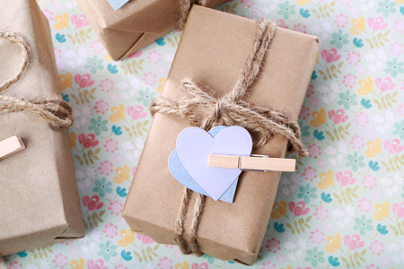 Handmade gift box with purple and blue hearts in rustic styleの写真素材