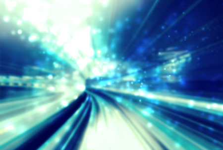 Light tunnel blue abstract futuristic pathway backgroundの写真素材