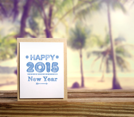 Happy New Year 2015 message card with palm trees