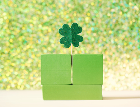 Saint Patricks Day green clover ornaments with wooden blocks
