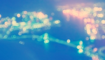 Blurred abstract bokeh background of the city at nightの写真素材