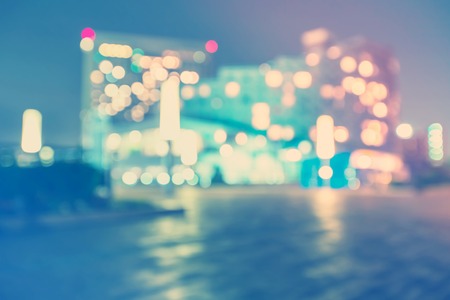 Blurred abstract bokeh background of the city at nightの写真素材