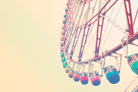 Retro style bright multi colored ferris wheelの写真素材