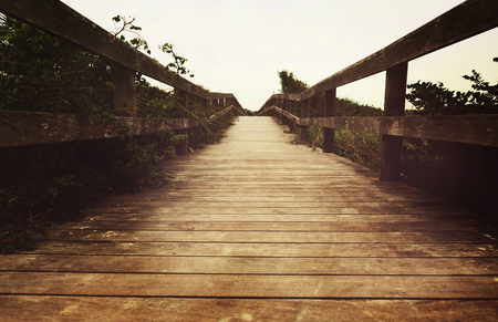 Wooden walkway entrance leading to the beachの写真素材