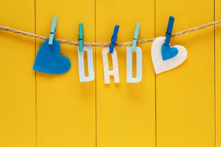 Fathers Day theme with hanging felt DAD lettersの写真素材