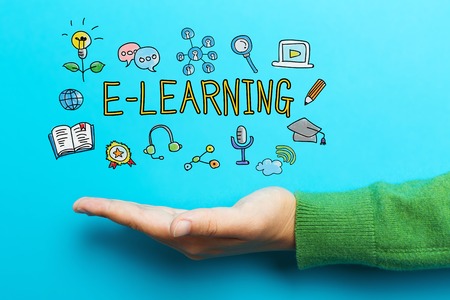 E-Learning concept with hand on blue background