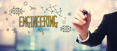 Businessman drawing Engineering concept on blurred abstract background の写真素材