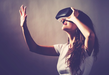 Young woman using a virtual reality headset