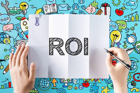 ROI text with hands and colorful illustrationsの写真素材