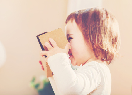 Toddler girl using a new virtual reality headset