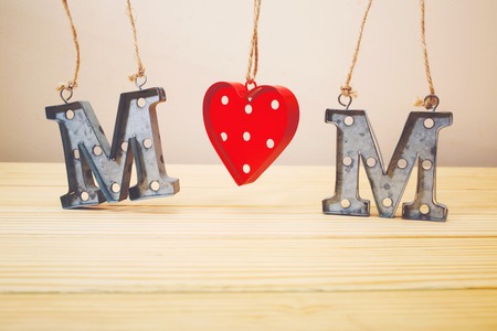 Mother's day celebration theme with metal MOM lettersの写真素材