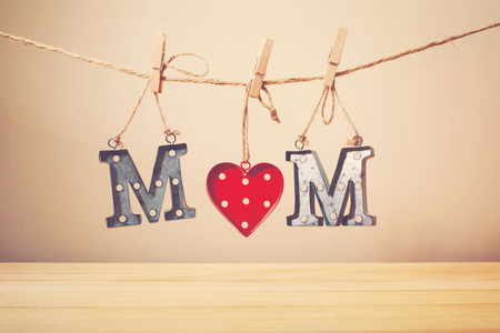 Mother's day celebration theme with metal MOM lettersの写真素材