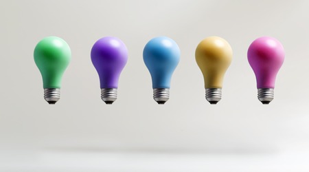 Colorful light bulbs floating in the airの写真素材