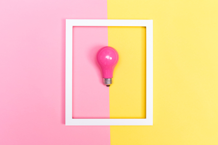 Colored lightbulb on a vibrant duotone backgroundの写真素材