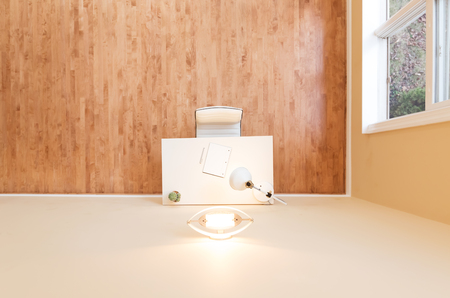 Workstation desk in a large interior roomの写真素材