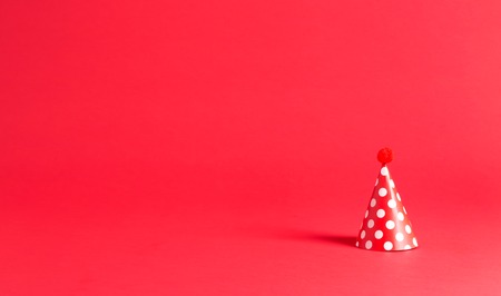 Party hat celebration theme on a bright backgroundの写真素材