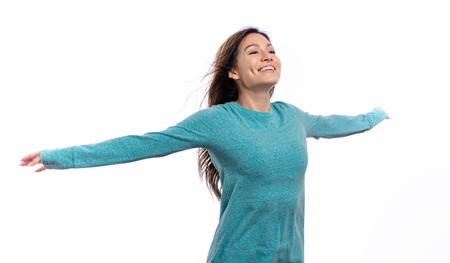 Happy woman with her arms outstreched isolated on white background