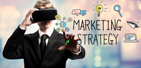 Marketing Strategy text with businessman using a virtual reality headsetの写真素材