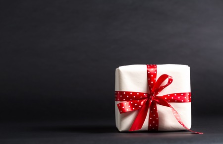Handmade present box on a black backgroundの写真素材