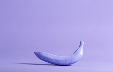 Painted funky banana on a bright backgroundの写真素材