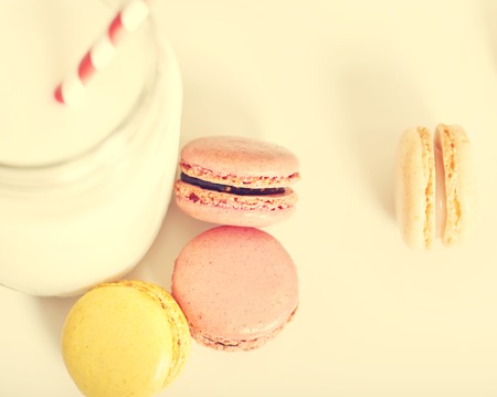 Macarons on a white table top backgroundの写真素材