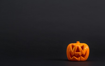 Halloween pumpkin decorations on a black backgroundの写真素材