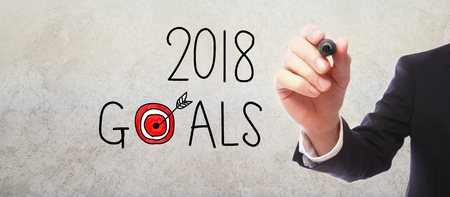 2018 Goals with businessman on gray wall backgroundの写真素材