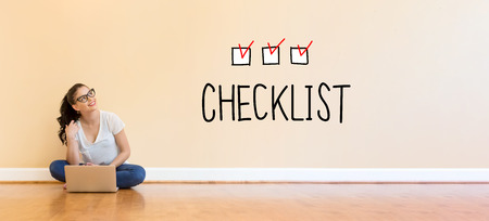 Checklist text with young woman using a laptop computer on floor