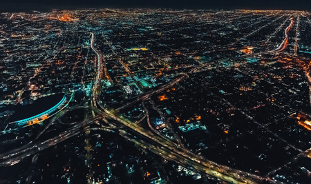 Aerial view of a massive highway in Los Angeles, CA at nightの写真素材