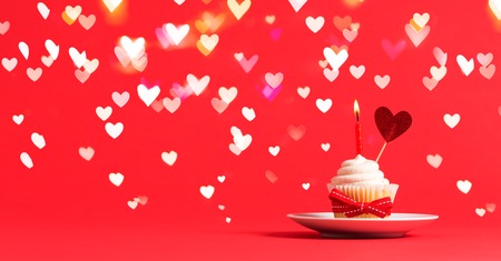 Valentines day theme with cupcake and heart ornamentの写真素材