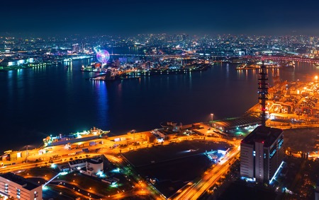 Aerial view of the Osaka Bay harbor area at nightの写真素材