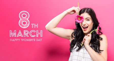 Womens Day message with young woman with garbela flowersの写真素材