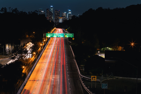 Highway leading to Downtown Los Angeles at nightの写真素材