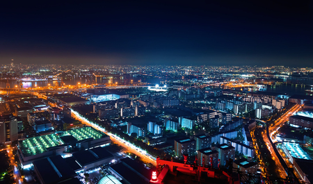 Aerial view of the Osaka Bay harbor area at nightの写真素材