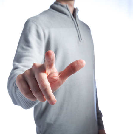 Man in pointing or pressing something on a white backgroundの写真素材
