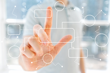 Flowchart with young man in front of windowsの写真素材