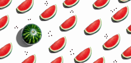 One out unique watermelons arranged on a white backgroundの写真素材